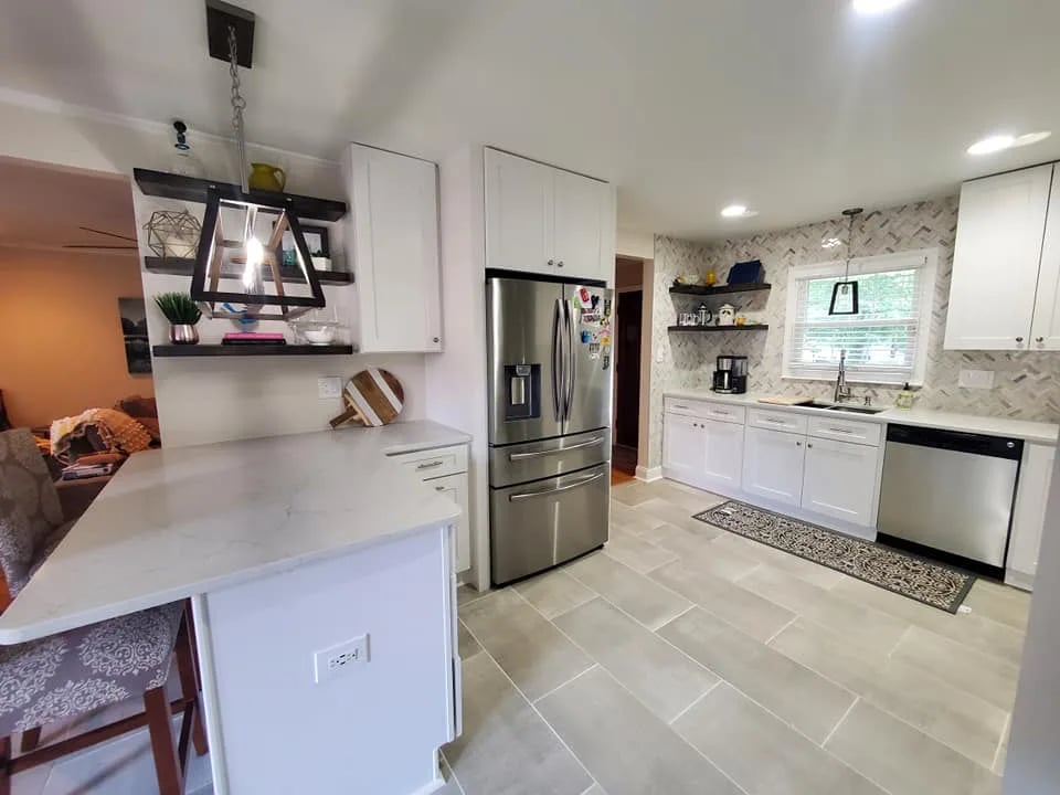 Custom kitchen remodel with premium cabinetry and stone countertops by The Rapalo Group